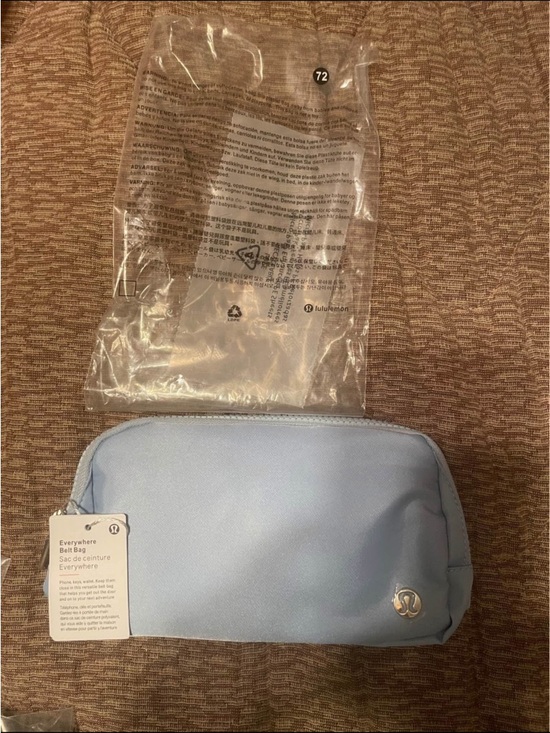 lululemon athletica Handbags - Lululemon Light Blue Everywhere Belt Bag / Small Pouch - NWT